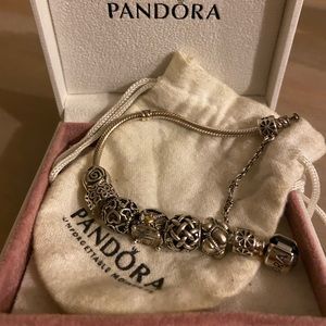 Pandora bracelet including charms